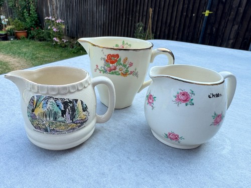 Three vintage ceramic milk