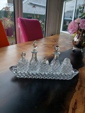 Vintage 5 bottle creut set with glass stand. Oil and vinegar bottles.