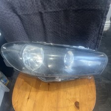 VOLKSWAGEN SCIROCCO Headlamp