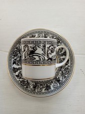 A Vintage Cup And 2 Saucers