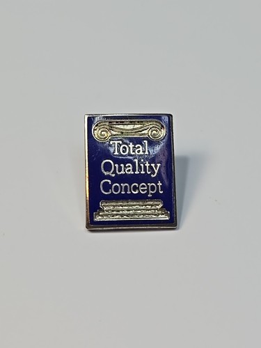 Total quality concept lapel - concept,