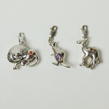 THREE SILVER MILANO CHARMS