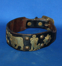 An antique dog collar, leather, brass cows and herder, 19th century
