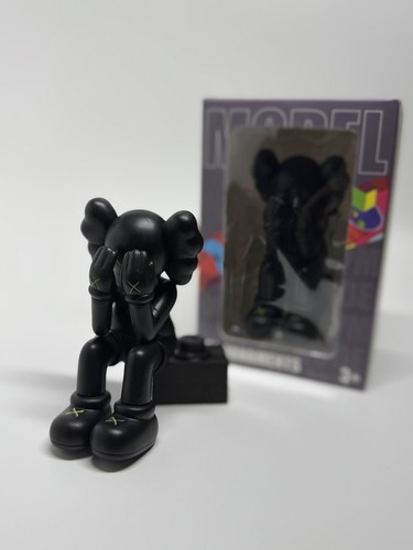 Kaws seated companion figure - seated,