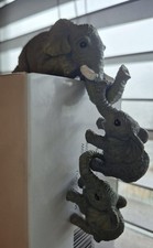 A Set of Elephant Shelf Sitter