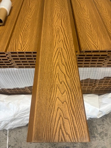 Teak embossed tongue groove - &,