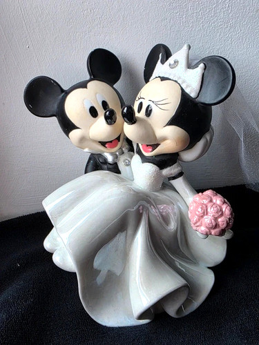Mickey and minnie figurine - and,