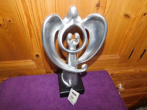 Guardian angel figure - , by