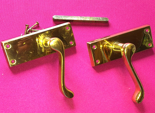 Brass door latches and - door,