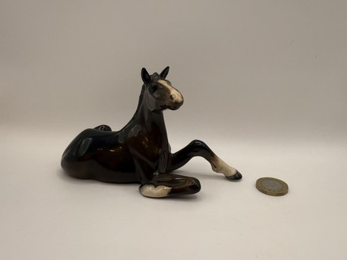 Beswick shire foal lying - beswick,