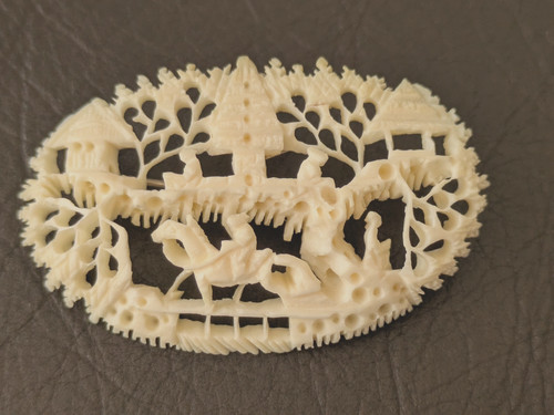 Celluloid brooch oriental - celluloid,
