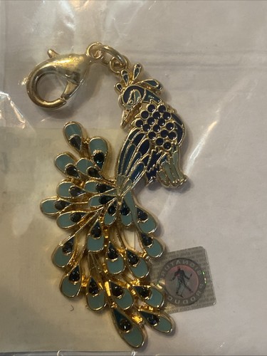 Graceland gold plated peacock - graceland,