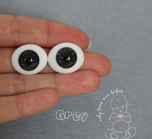 Solid glass eyes oval flat
