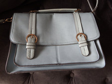 Pale blue satchel bag zip pockets gold detail detachable shoulder strap buckles