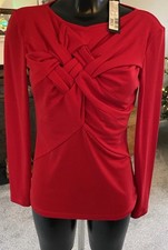 Isabel de Pedro Red Sculpted