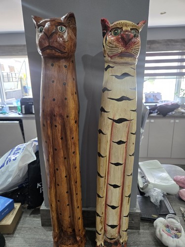 Pair striking hand carved - pair,