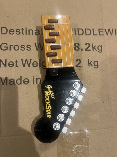 Tomy practise air guitar toy
