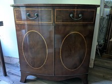 Mahogany bow fronted TV type cabinet (Harrods)