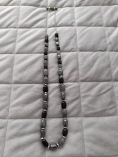 A BLACK/GREY ADJUSTABLE NECKLACE  BY LOLA ROSE FROM QVC UK SORRY NO POUCH.