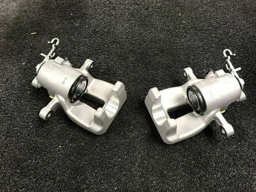 New rear brake caliper - lh, rh