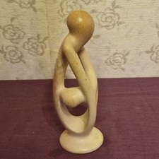 Mother Holding Child Abstract