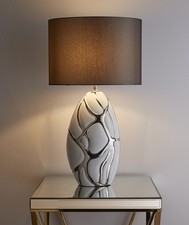 Tall white with silver Table