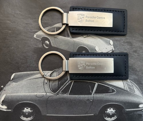 Two genuine porsche - genuine, keyrings