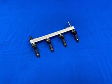 VAUXHALL CORSA D GENUINE 1.2 1.4 PETROL FUEL INJECTOR RAIL A12XER 55562258