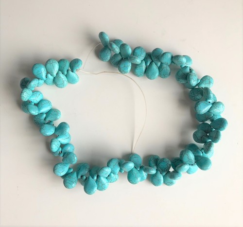 String turquoise teardrop - of,