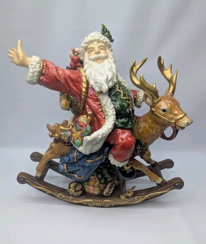 Santa riding rocking deer - santa,