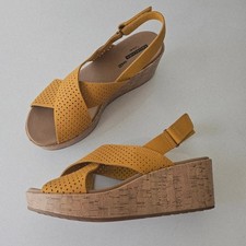 7 E Clarks high heel wedges