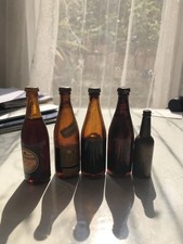 5 Miniature Guinness Bottles 1 Is A Brass Lighter