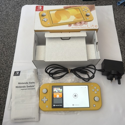 Nintendo switch lite yellow - nintendo,
