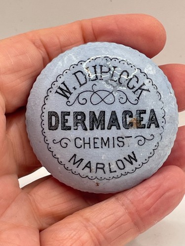 Antique porcelain bottle top