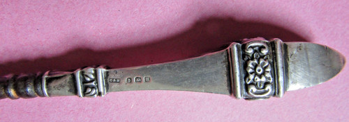 Antique silver handled button - handled,
