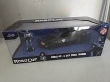 Robocop Figure and OCP Ford