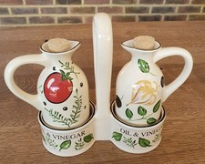 Retro Rayware Oil and Vinegar Bottles with Vibrant Vegetable Design.