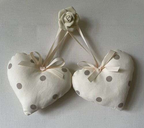 Pair cushioned heart - of,