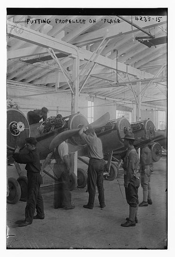 Workers putting propeller an - workers,