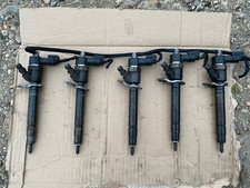 Set of 5 injectors for some Volvo xc90  xc70 v70 s60 2.4 d5 185 diesel 30750283