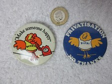 2 Vintage Buzby BT Pin Badges