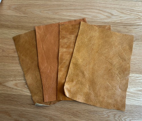 Pack tan leather pieces - of,