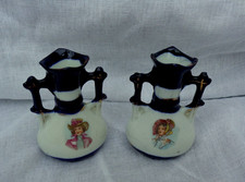 A delightful pair of antique, hand-painted  porcelain vases rare examples