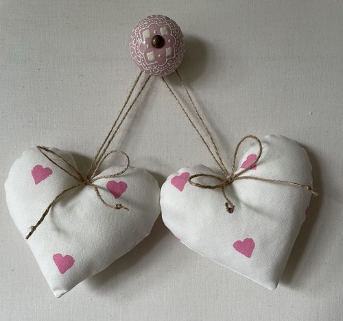 Pair heart door hangers in - of,