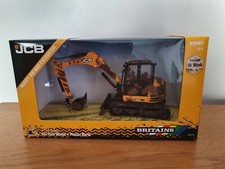 BRITAINS AT WORK MUDDY JCB