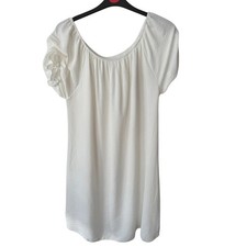Will fit 14-20 as very flowing cotton like fabric.One size summer white dress