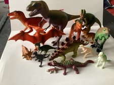 Prehistoric Dinosaurs unbranded plastic In various positions And Heights