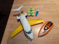 Playmobil vintage plane (including passengers and pilots) and boats