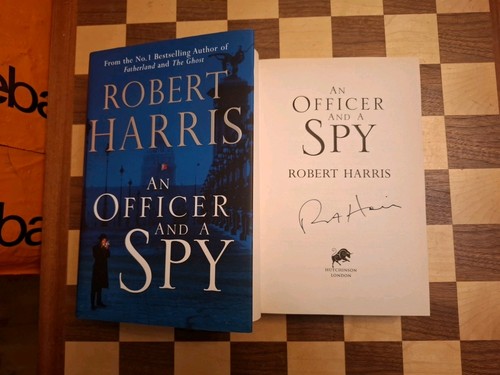 Officer and spy signed - a,
