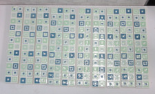 Set of 10 ceramic border tiles from Tile Gallery’s Mellow Retro Squares range